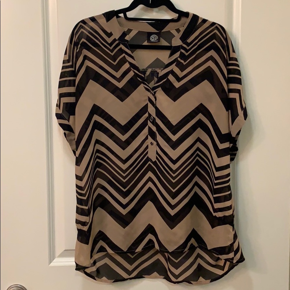 Nude and black sheer blouse with button detail